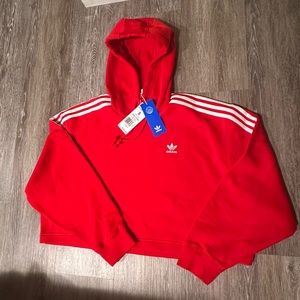 Women’s Adidas red cropped sweatshirt size small.